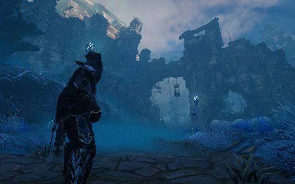 HD desktop wallpaper featuring a mysterious figure from the video game Enshrouded standing in a mystical blue-tinged landscape with ancient ruins in the background.