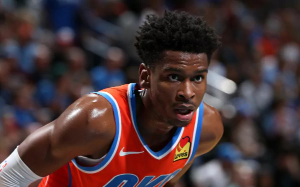 HD wallpaper of a focused Oklahoma City Thunder player in action, representing the team with intensity.