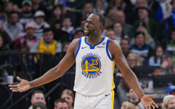 Golden State Warriors player in action on the court for HD desktop wallpaper and background.