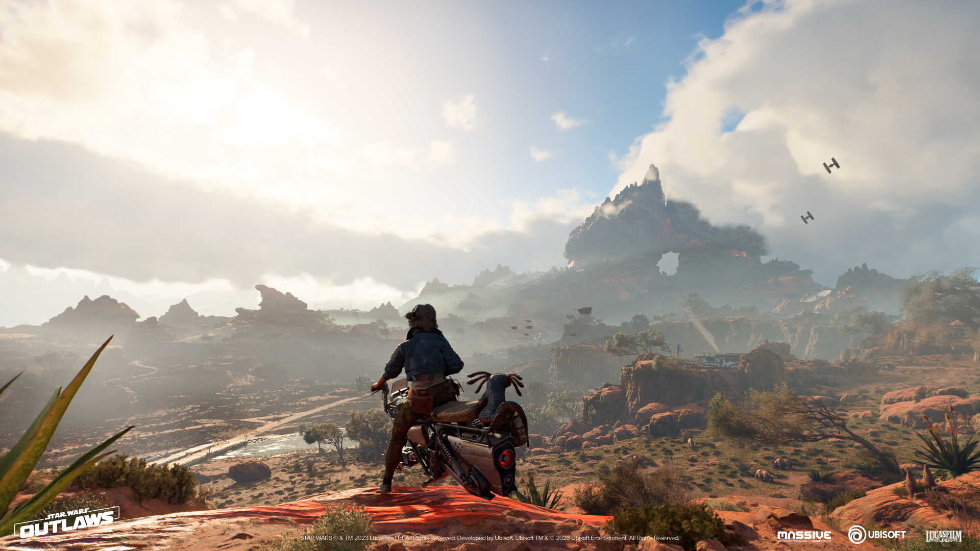 HD desktop wallpaper featuring a scene from the video game Star Wars Outlaws, with a character on a speeder bike overlooking a rugged desert landscape under a hazy sky.