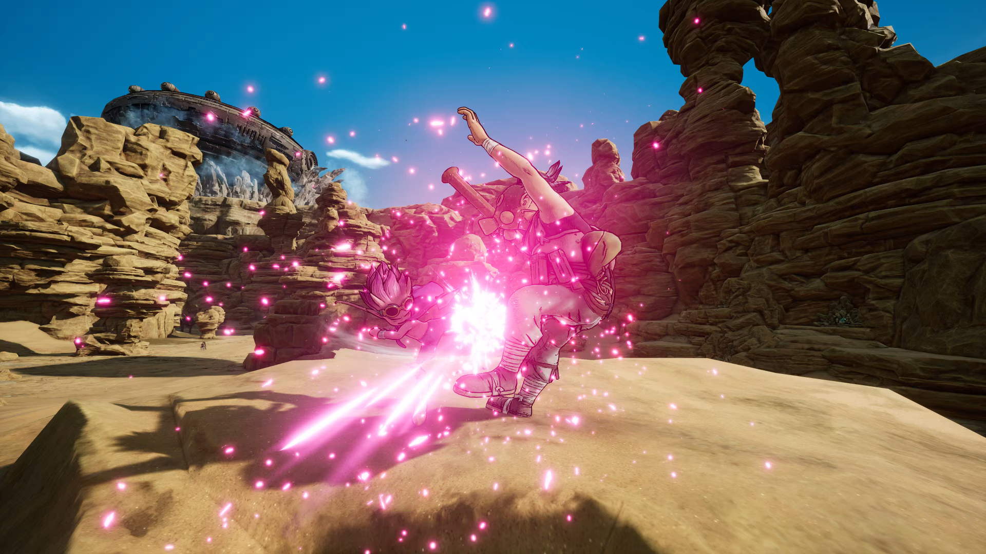 HD wallpaper from the video game Sand Land featuring a character engaged in combat with a bright energy blast effect amidst a desert canyon setting.