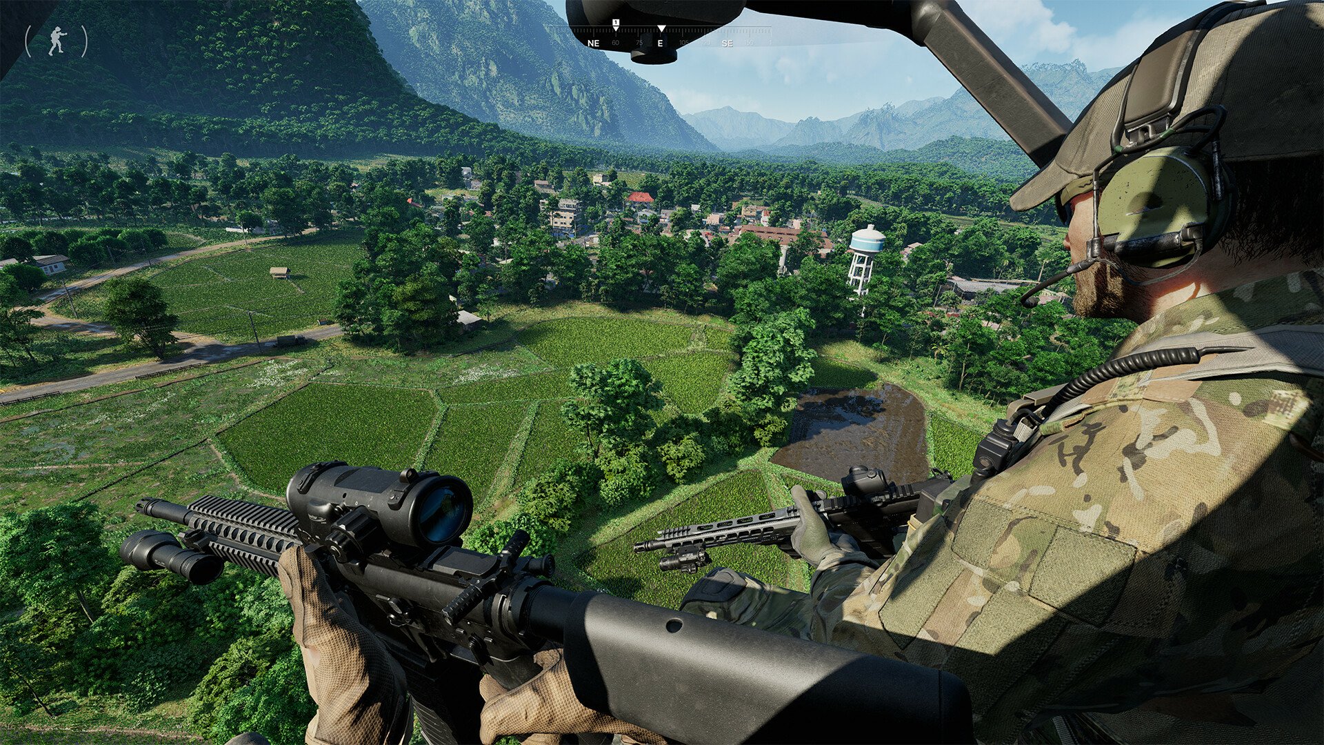 HD desktop wallpaper featuring a first-person view from a helicopter in the video game Gray Zone Warfare, overlooking a lush, mountainous landscape.