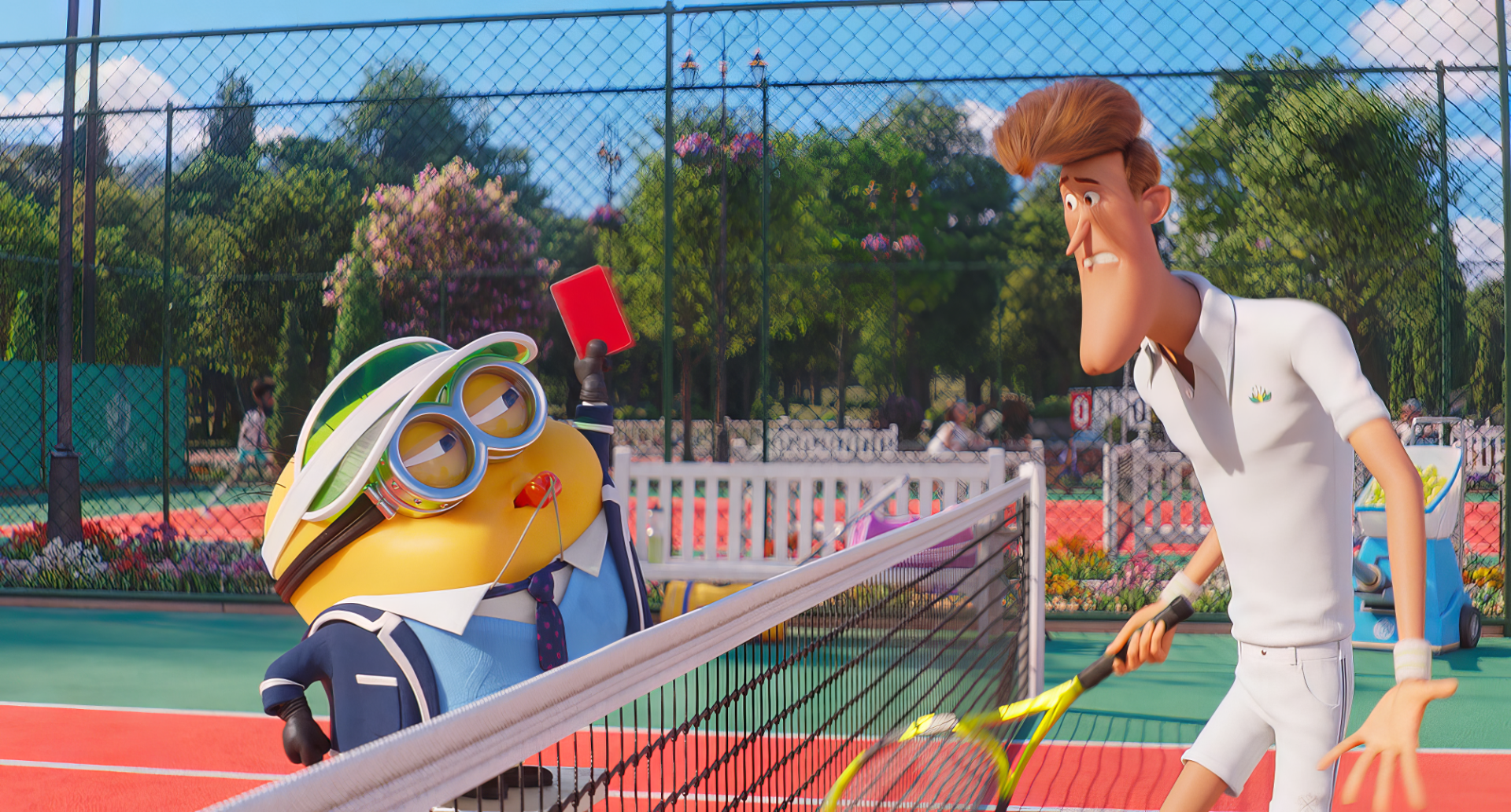 HD desktop wallpaper showing a scene from Despicable Me 4, featuring a Minion in a referee outfit giving a red card to a man playing tennis on a sunny day.