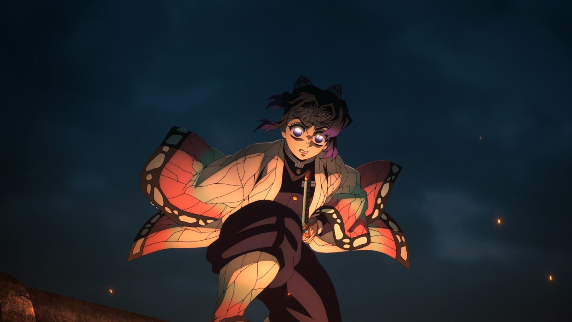 HD PC desktop wallpaper of Tanjiro Kamado from Demon Slayer: Kimetsu no Yaiba, depicted in dynamic action against a dark, fiery background.