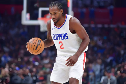 Kawhi Leonard of the Los Angeles Clippers dribbling a basketball in-game, captured in a high-definition desktop wallpaper.