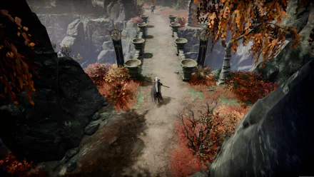 HD desktop wallpaper from the video game V Rising, featuring a character walking on a path flanked by statues and autumnal trees.