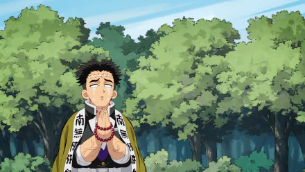 HD PC desktop wallpaper featuring Gyomei Himejima from the anime Demon Slayer: Kimetsu no Yaiba, standing with a serene forest background.