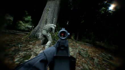 HD desktop wallpaper showing a first-person shooter video game scene from a bodycam perspective, with a soldier aiming a rifle at another soldier hiding behind a tree in a forest setting.