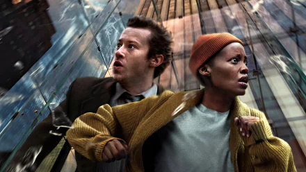 HD desktop wallpaper featuring a scene from A Quiet Place: Day One with Lupita Nyong'o and Joseph Quinn in a dramatic, intense setting.