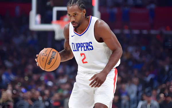 Kawhi Leonard of the Los Angeles Clippers dribbling a basketball in-game, captured in a high-definition desktop wallpaper.