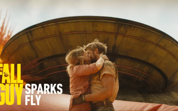 HD desktop wallpaper of The Fall Guy featuring a man and woman embracing in front of a large, circular structure with the tagline SPARKS FLY.