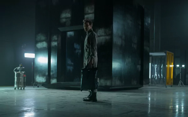 HD wallpaper of Joel Edgerton in a dark, industrial setting from the 2024 TV show Dark Matter.