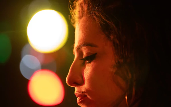 HD desktop wallpaper and background featuring a close-up profile of Amy Winehouse, tagged with movie and Back to Black, against a backdrop of colorful, out-of-focus lights.