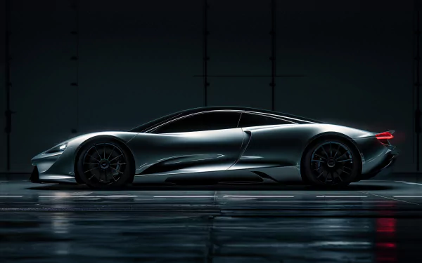 HD desktop wallpaper features a sleek McLaren Speedtail car in a dark, glossy setting, emphasizing its aerodynamic design and futuristic aesthetic.