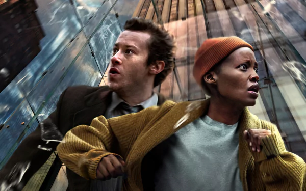 HD desktop wallpaper featuring a scene from A Quiet Place: Day One with Lupita Nyong'o and Joseph Quinn in a dramatic, intense setting.