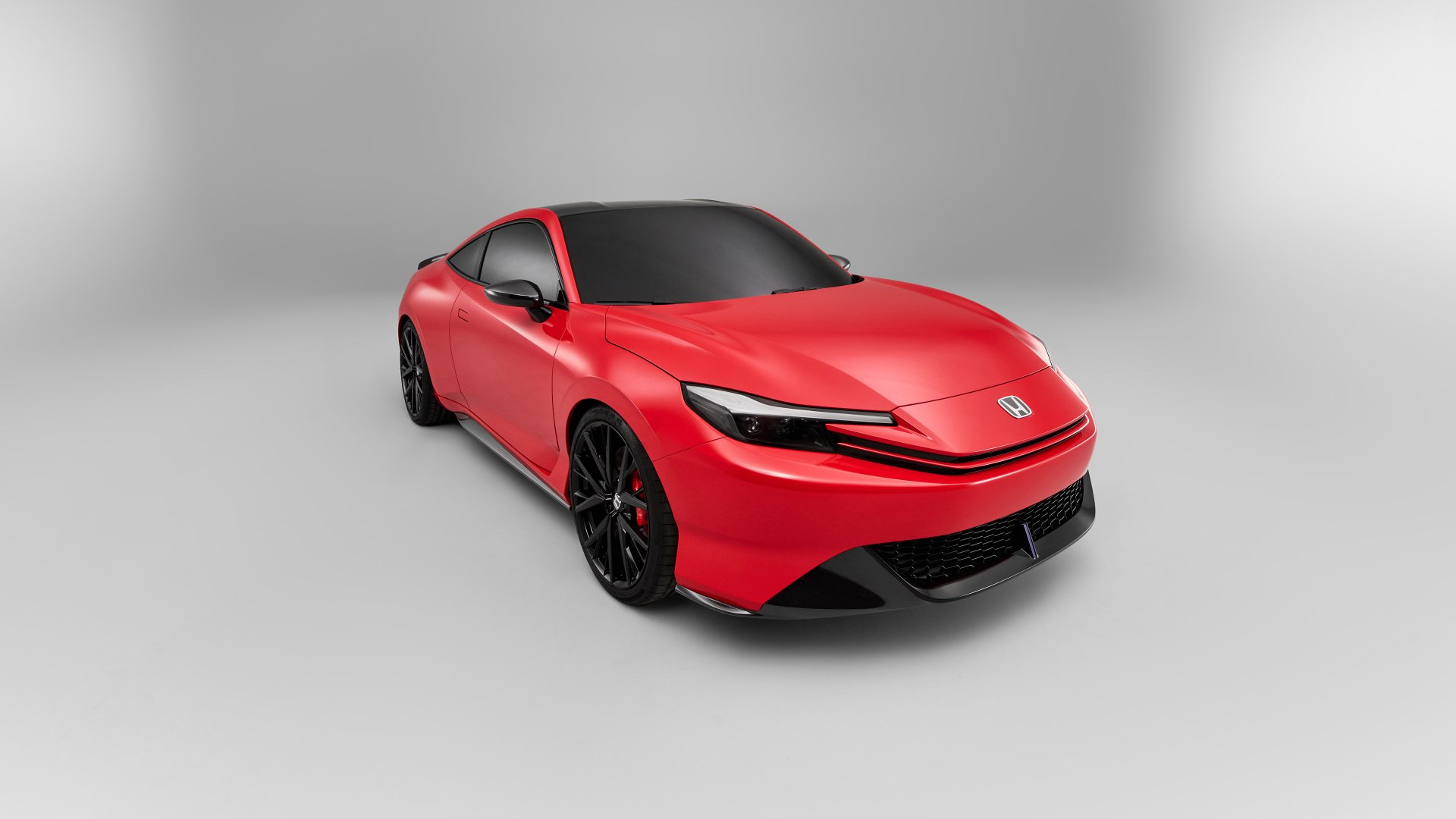 A high-definition desktop wallpaper featuring a Honda Prelude, showcasing the sleek design and dynamic presence of this classic car model.