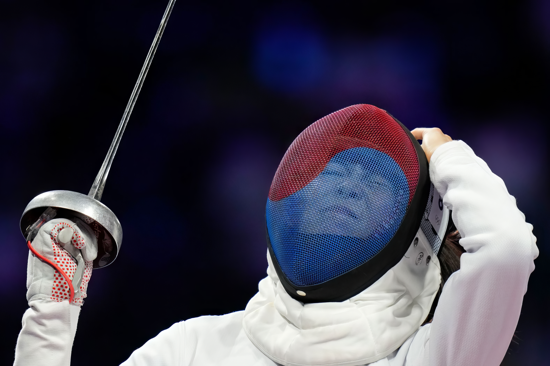 A dynamic HD wallpaper showcasing South Korean fencers in action, celebrating the spirit of the Olympic Games Paris 2024 and the excitement of competitive fencing.