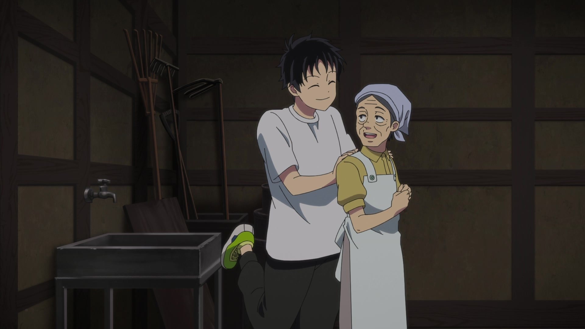 A heartwarming scene from Zom 100: Bucket List of the Dead, featuring Akira Tendo sharing a joyful moment with an older character in a rustic setting. HD desktop wallpaper.