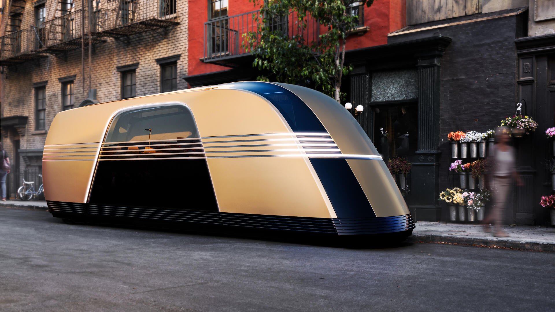 A sleek, futuristic Tesla robovan stands on a city street, showcasing its unique design with a blend of gold and dark blue colors against a backdrop of urban architecture.