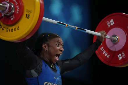 High-definition wallpaper featuring weightlifting, celebrating Colombia's participation in the Olympic Games Paris 2024. Embrace the spirit of sports and competition.