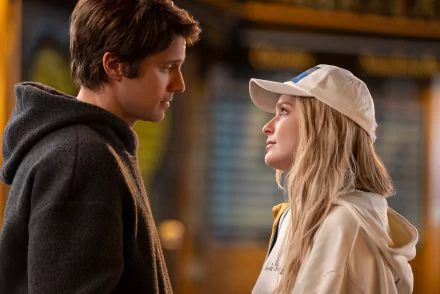 HD desktop wallpaper featuring a scene from Emily in Paris, capturing the show's vibrant style and Parisian flair. A perfect backdrop for fans of the series.