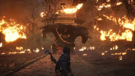 A dramatic scene from the video game Black Myth: Wukong, featuring a fierce battle with a large, fiery creature against a backdrop of flames and destruction.