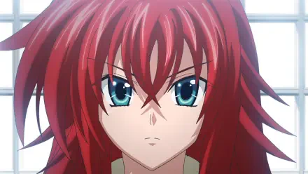 Anime wallpaper featuring Rias Gremory from High School DxD, showcasing her striking red hair and intense blue eyes, capturing her strong presence in HD quality.