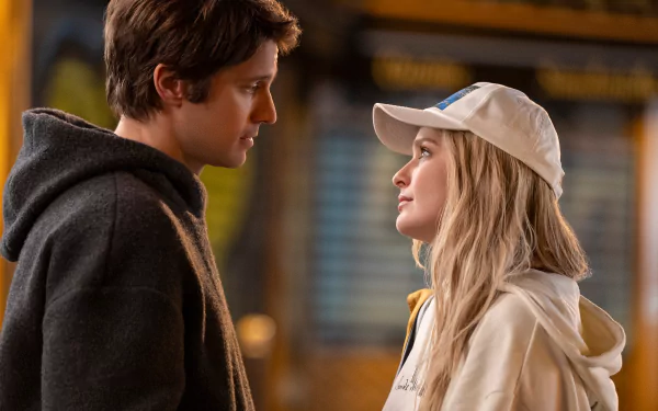 HD desktop wallpaper featuring a scene from Emily in Paris, capturing the show's vibrant style and Parisian flair. A perfect backdrop for fans of the series.