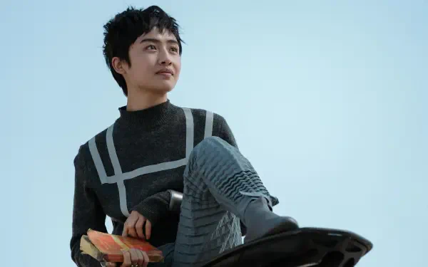 A character from the movie Uglies sits confidently on a futuristic board against a clear sky, showcasing a striking 4K Ultra HD visual for desktop wallpaper and background.