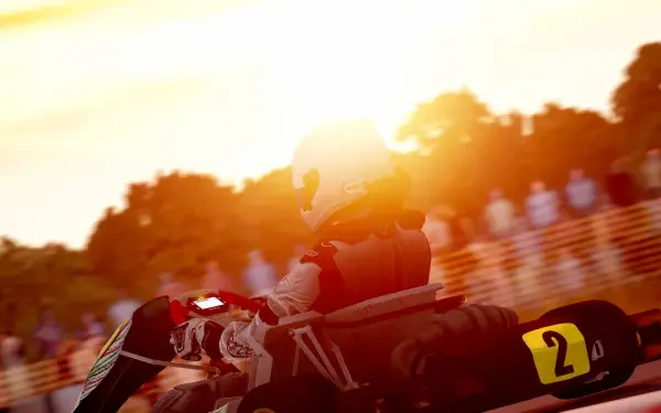  Karting At Sun-Blinding Sunset focused in helmet
