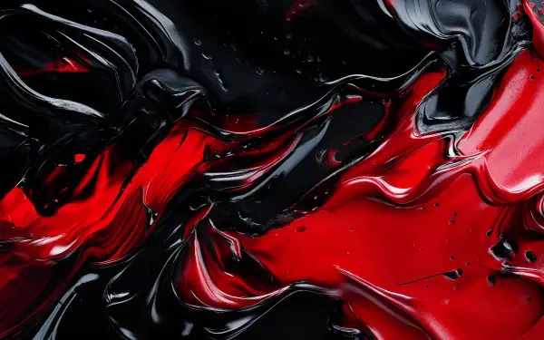 An abstract 4K Ultra HD wallpaper featuring swirling liquid textures in deep black and vibrant red, creating a striking visual contrast.