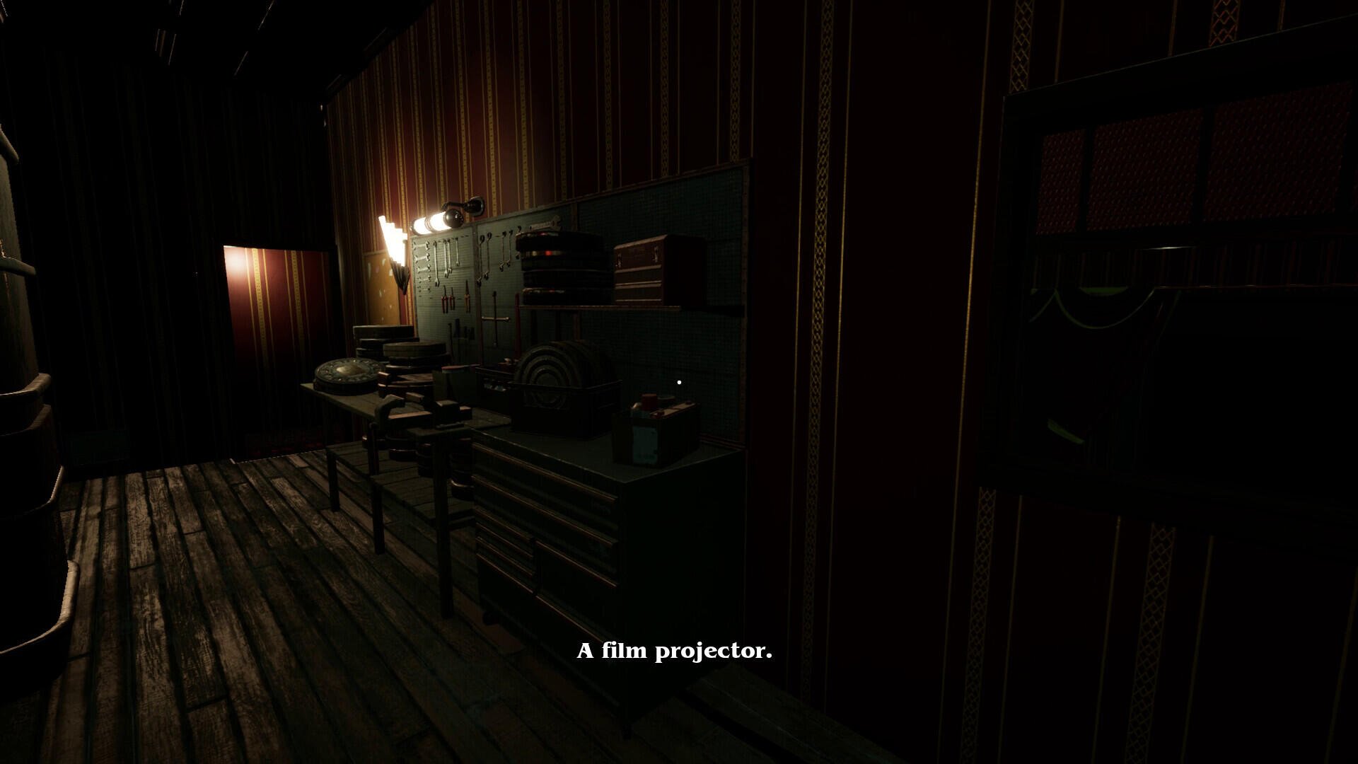 A dimly lit room featuring a film projector and various equipment, serving as an engaging backdrop for the video game Massacre At The Mirage. HD PC desktop wallpaper.