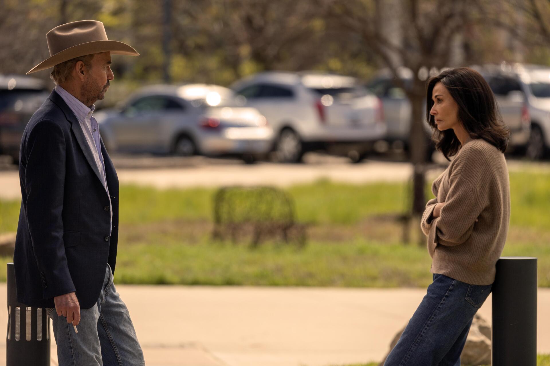 Billy Bob Thornton and Demi Moore in a scene from the TV show Landman, captured in a 4K Ultra HD image depicting an outdoor conversation.