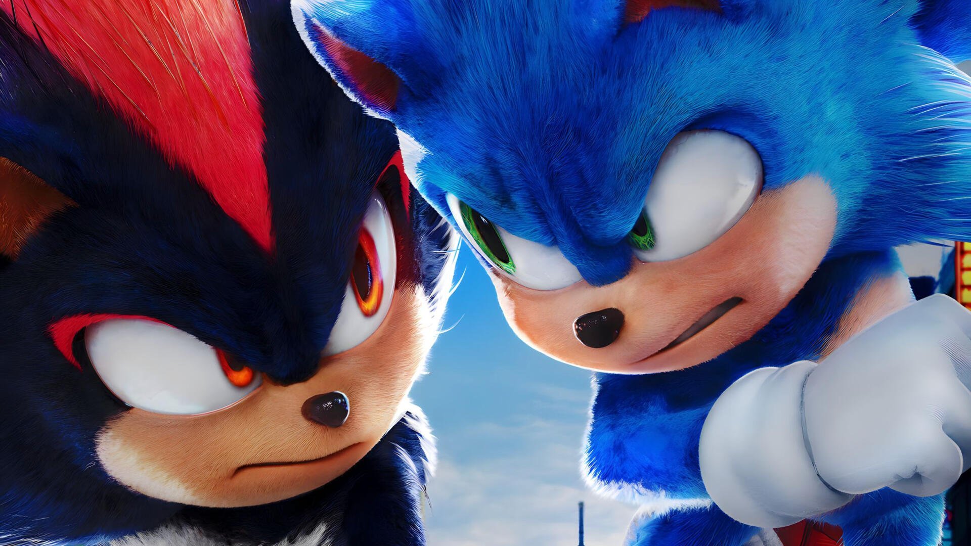 HD PC desktop wallpaper featuring close-up faces of Sonic the Hedgehog and Shadow from Sonic the Hedgehog 3, showcasing intense expressions in vibrant colors.