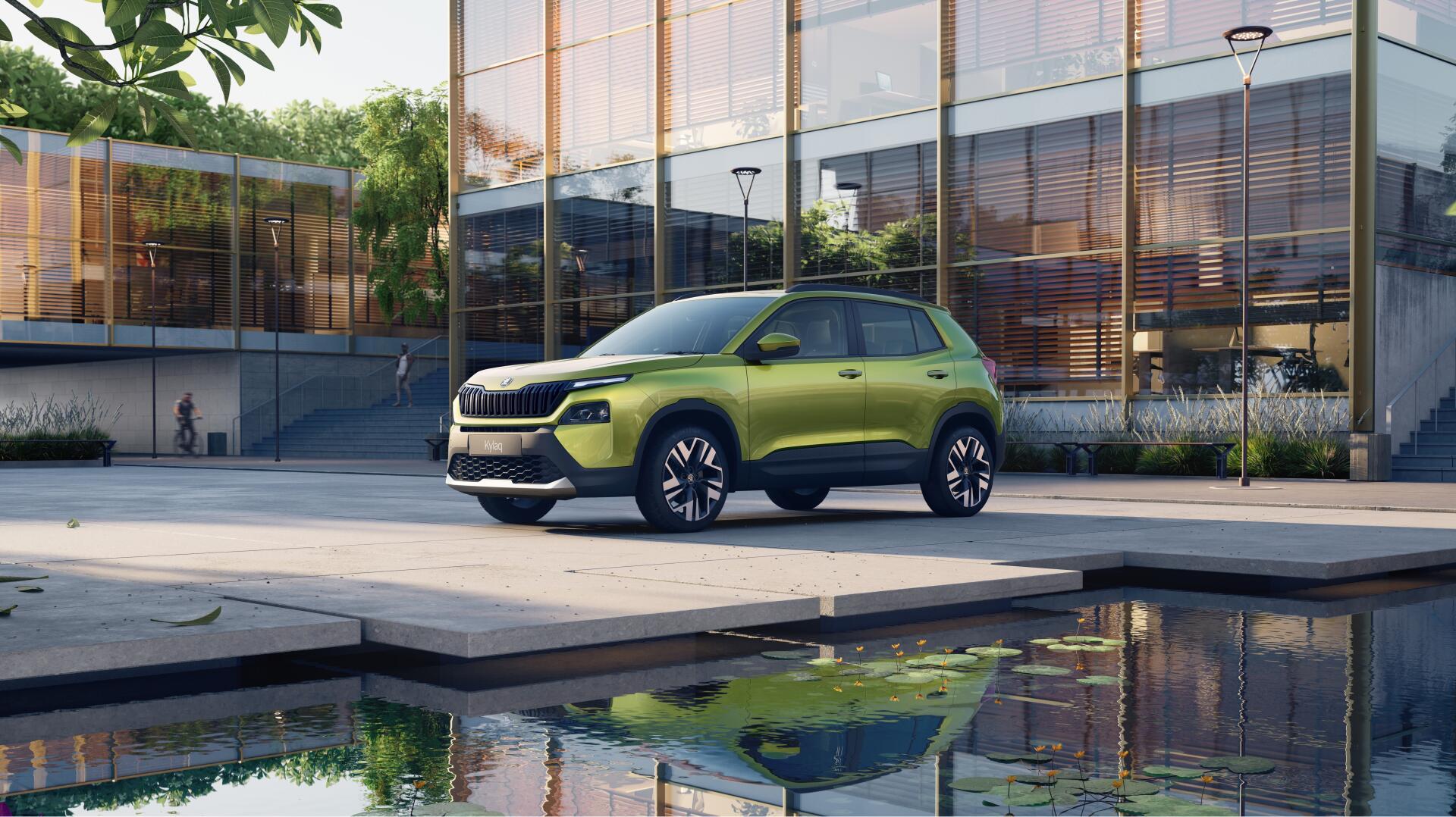 A Škoda Kylaq parked by a modern building, reflecting in a serene pool. This vibrant green SUV captures attention in this 4K Ultra HD desktop wallpaper.