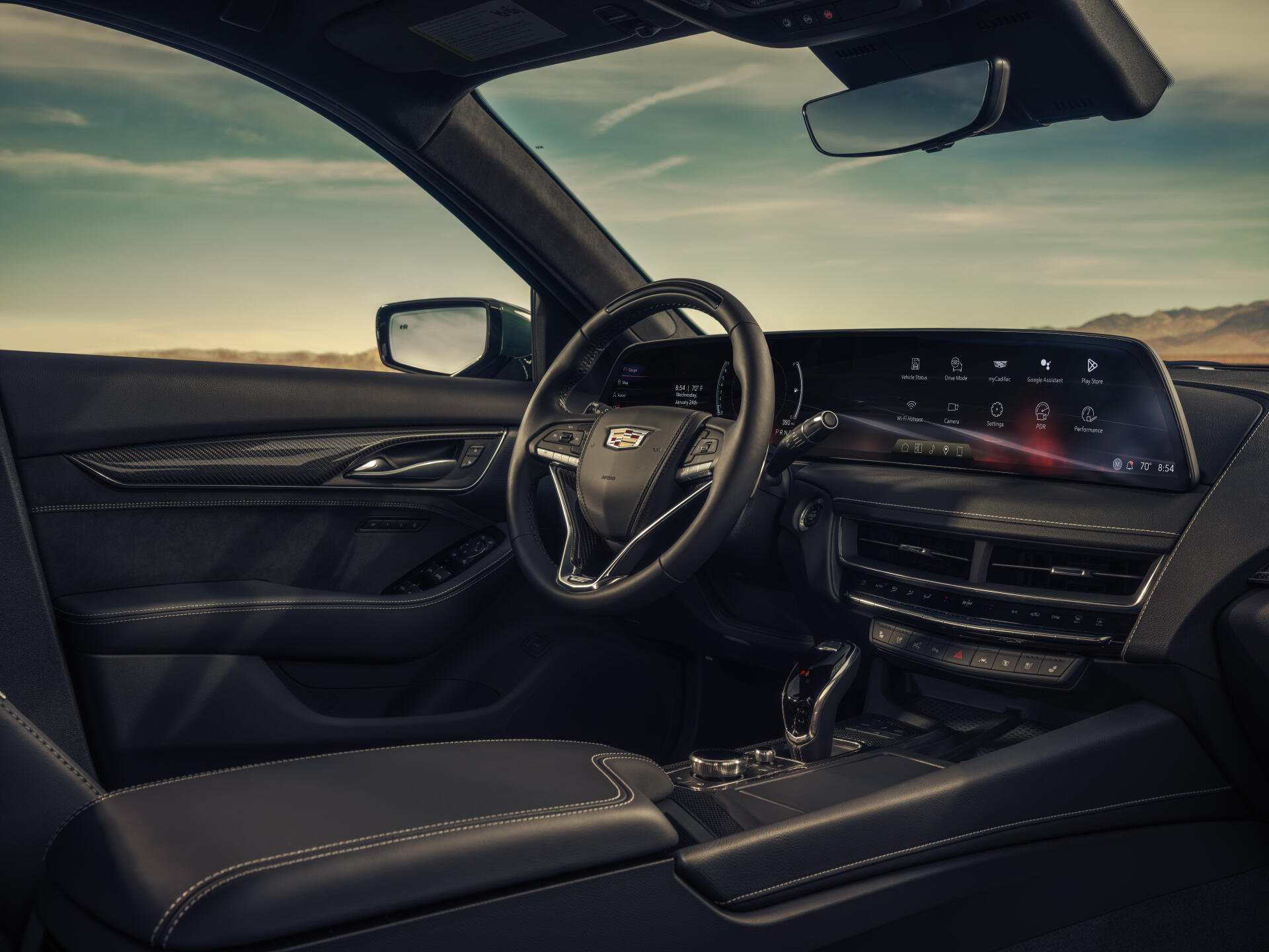 Interior dashboard and steering wheel of a Cadillac CT5-V Blackwing, captured in stunning 8K Ultra HD for a high-resolution PC desktop wallpaper.