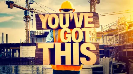 A construction worker in a hard hat holds a large sign that reads YOU'VE GOT THIS, set against a vibrant construction site backdrop. 4K Ultra HD wallpaper for motivation.