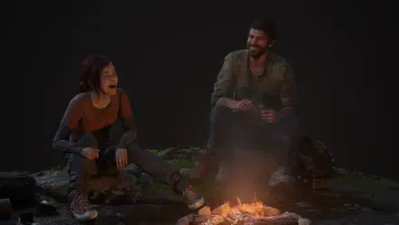 A high-definition desktop wallpaper featuring Joel and Ellie from The Last of Us sharing a moment by a campfire, highlighting their bond amidst a post-apocalyptic setting.