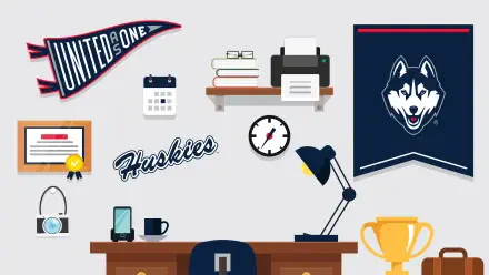 A dynamic UConn Athletics-themed desktop wallpaper featuring a desk with academic items, a trophy, and Husky spirit elements, showcasing school pride in vibrant 4K Ultra HD.