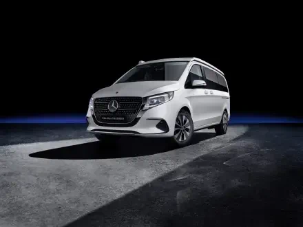 A sleek Mercedes-Benz V-Class Marco Polo showcased in 4K Ultra HD, highlighting its modern design against a dark background, emphasizing elegance and versatility.