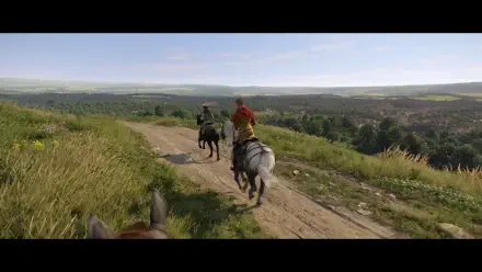 A scenic HD wallpaper from Kingdom Come: Deliverance II, showcasing a lush landscape with riders on horseback traveling a tranquil dirt path under a clear blue sky.