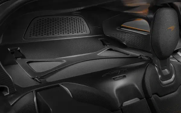 Close-up view of the sleek interior of a McLaren W1, showcasing its modern design and high-performance features. An 8K Ultra HD PC desktop wallpaper and background.