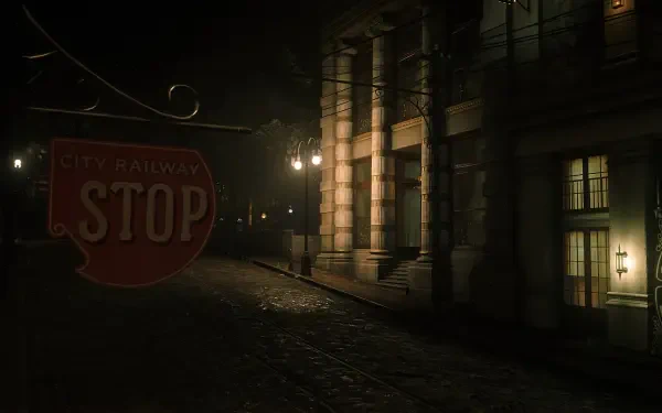 Dark, atmospheric Red Dead Redemption 2 HD PC desktop wallpaper: moonlit cobblestone street at night with a vintage STOP railway sign and lit stone building windows.