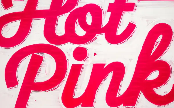 A vibrant hot pink design featuring bold typography, presented as a 4K Ultra HD PC desktop wallpaper and background, adding a striking touch to your screen.