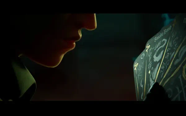 A close-up of a person's face, focusing on their lips, as they engage with intricately designed game cards, evoking the theme of Sleight of Hand in this 4K Ultra HD video game wallpaper.