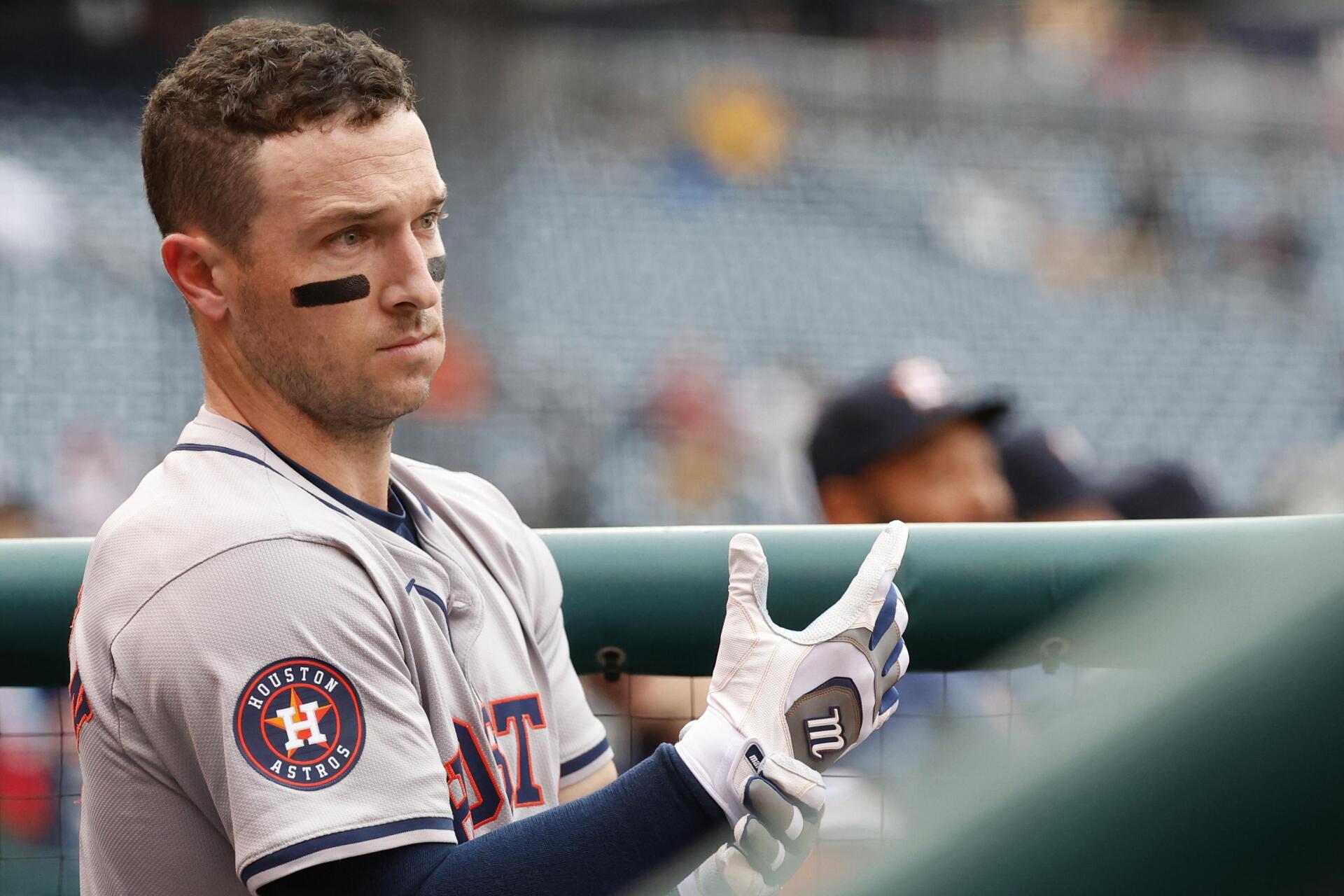 Alex Bregman of the Houston Astros prepares for action, showcasing his determination in a high-definition baseball moment. Ideal HD wallpaper for MLB fans.