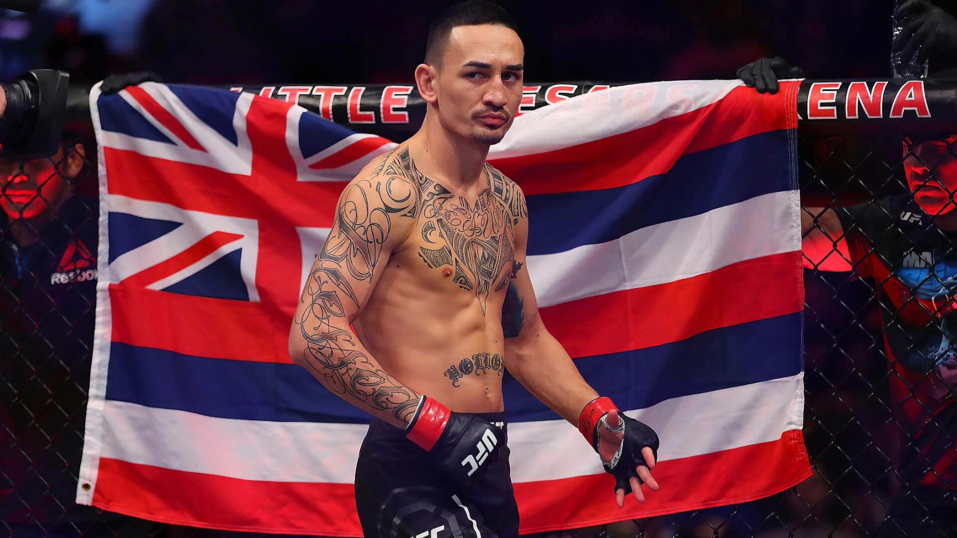 HD desktop wallpaper of UFC fighter Max Holloway in the octagon, showcasing his tattoos and the Hawaiian flag behind him, representing MMA and sports.