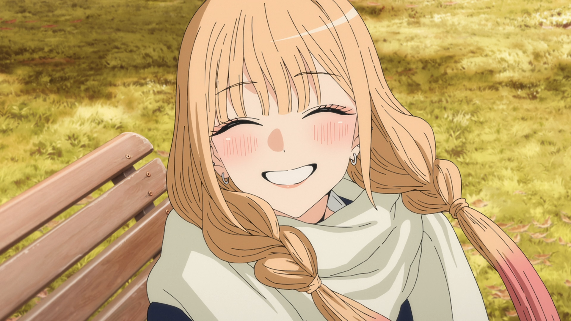 Anime HD PC desktop wallpaper/background of Marin Kitagawa from My Dress‑Up Darling, smiling on a park bench in a cozy scarf with warm autumn tones.