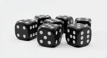 A collection of black dice with white spots, arranged artistically, presented as a 4K Ultra HD PC desktop wallpaper and background.