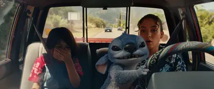 A scene from the movie Lilo & Stitch (2025), featuring a young girl and a character resembling Stitch in a car, set against a colorful backdrop and a feeling of adventure.